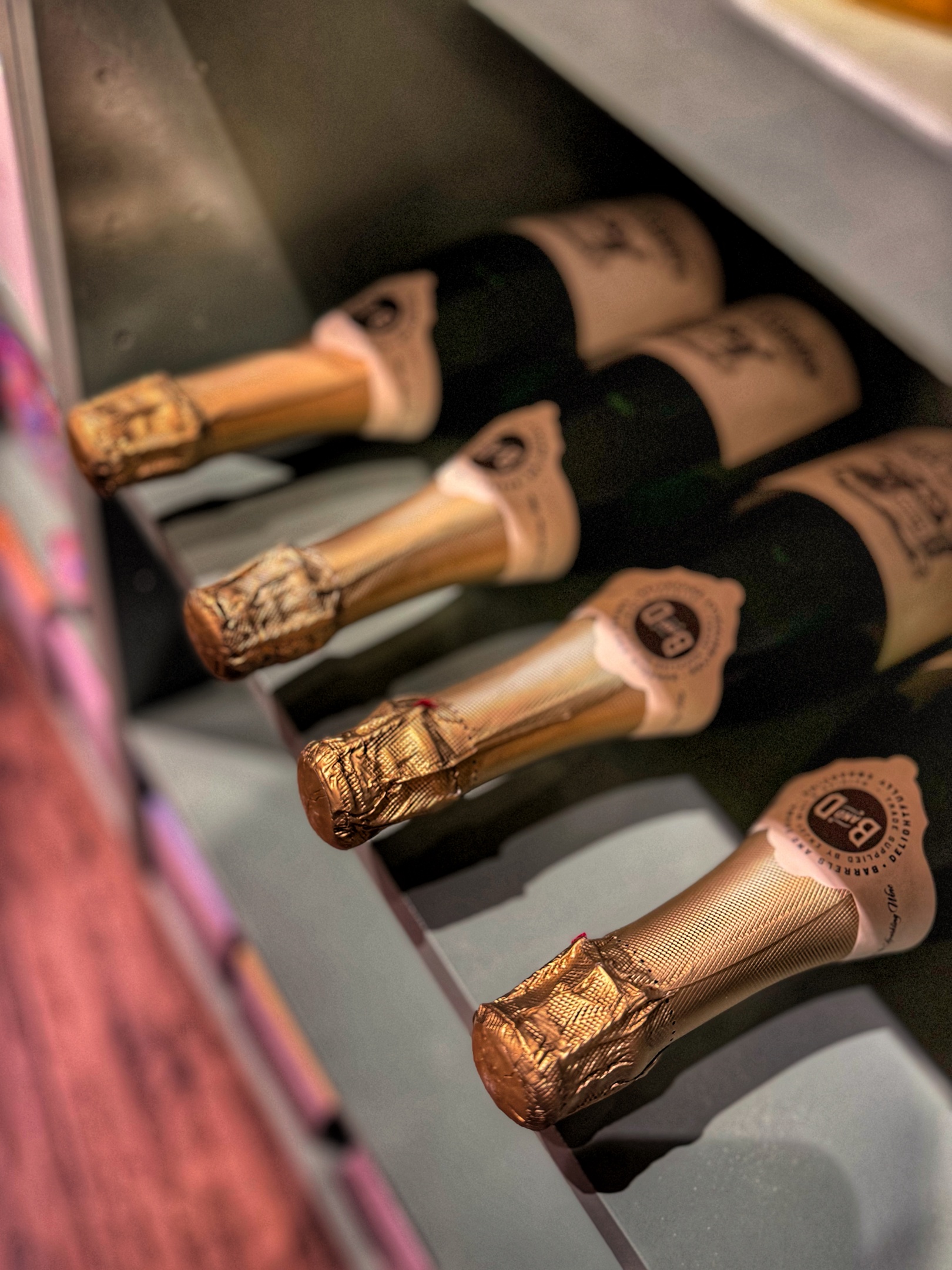 A large bouquet of red flowers with a red bow