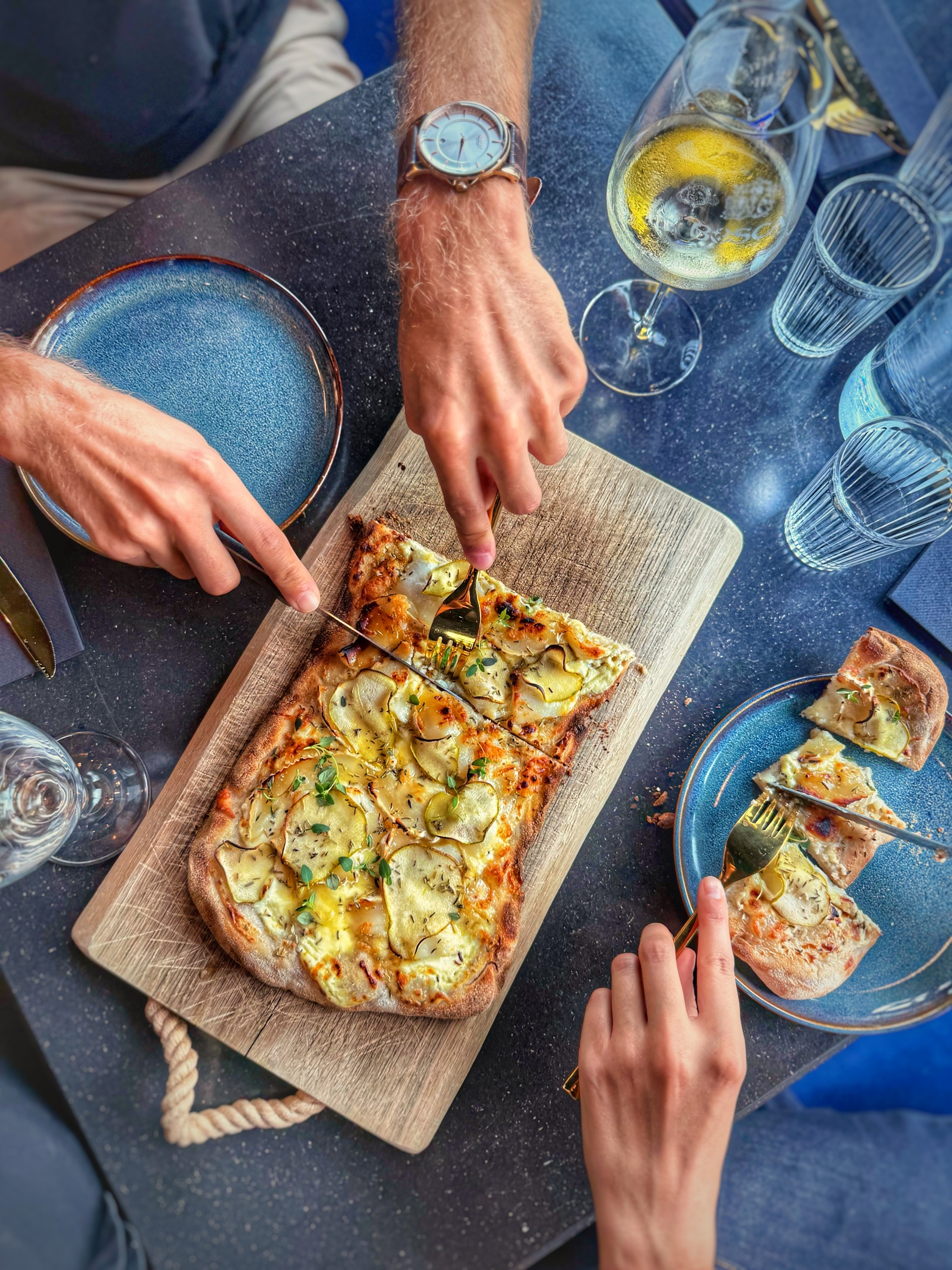 white candles on black surface